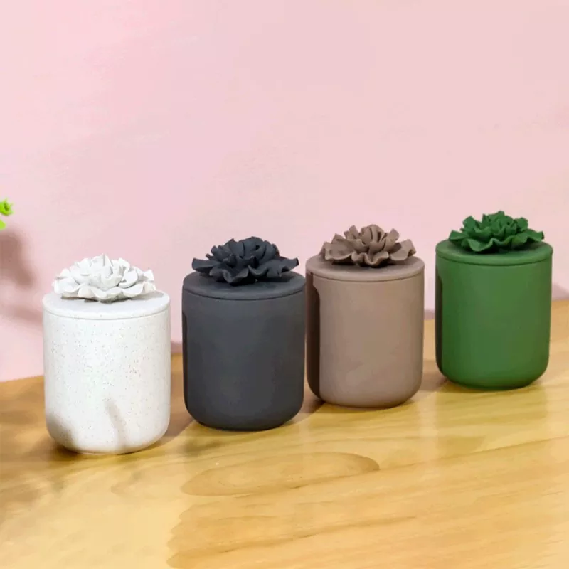 Portacandele in ceramica con petali in rilievo